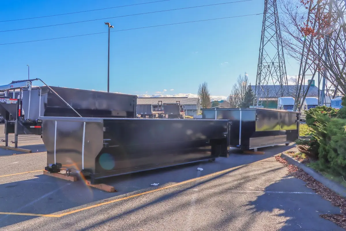 Roll-off dumpster ready for waste disposal at job site for Commercial Dumpster Rental in Redmond